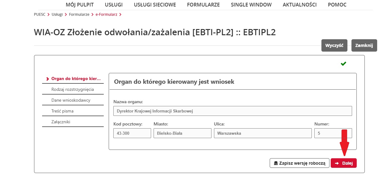 fragment ekranu systemu PUESC z czerwoną strzałką wskazującą na tekst: „Dalej”.